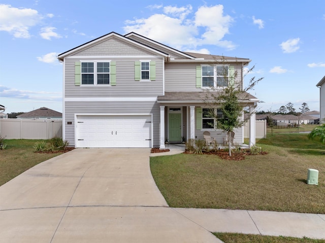 view of front of property with driveway, a garage, fence, and a front lawn