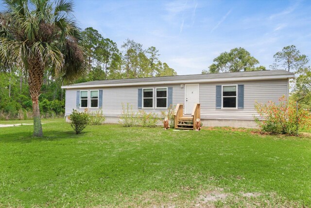 10160 Ebert Ave, Hastings, FL 32145 - view of front of property featuring a front lawn