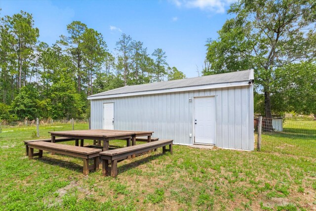 10160 Ebert Ave, Hastings, FL 32145 - view of outdoor structure with an outbuilding and outdoor dining space