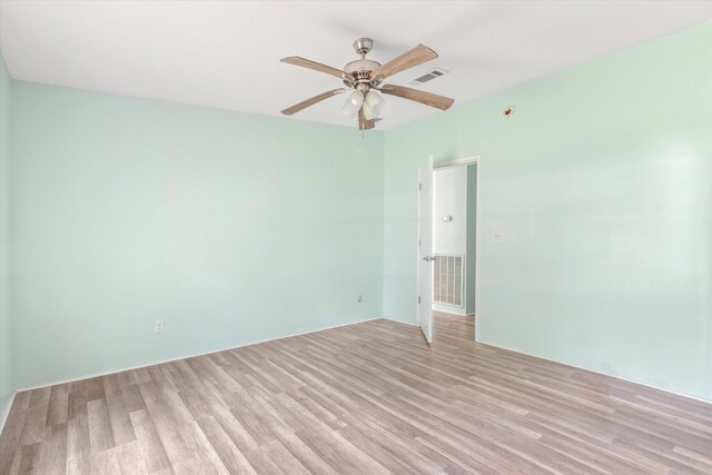 10160 Ebert Ave, Hastings, FL 32145 - spare room featuring light wood-style floors and a ceiling fan