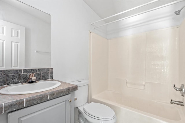 10160 Ebert Ave, Hastings, FL 32145 - bathroom with tasteful backsplash, toilet, vanity, and bathtub / shower combination