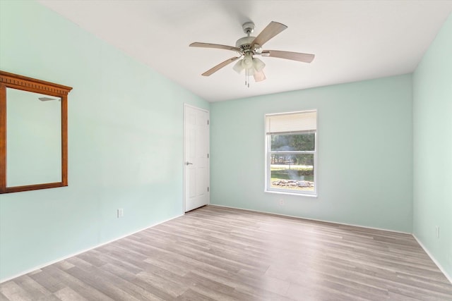 10160 Ebert Ave, Hastings, FL 32145 - empty room with wood finished floors and a ceiling fan
