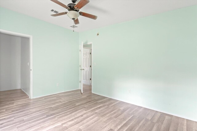 10160 Ebert Ave, Hastings, FL 32145 - spare room featuring light wood-style flooring and ceiling fan