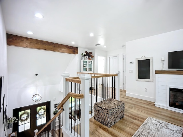 8975 Reid Packing House Rd, Hastings, FL 32145 - hallway featuring an upstairs landing, light wood finished floors, recessed lighting, and beamed ceiling