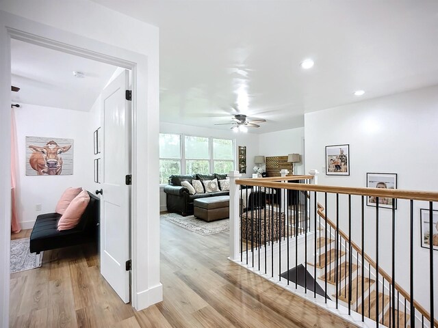 8975 Reid Packing House Rd, Hastings, FL 32145 - hall featuring an upstairs landing, light wood finished floors, and recessed lighting