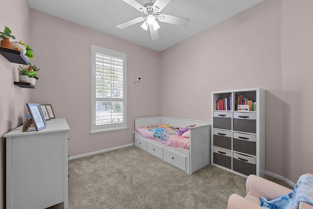 bedroom with light carpet and ceiling fan