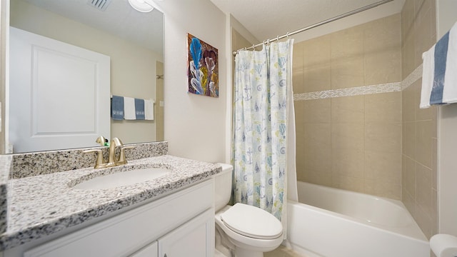full bathroom with vanity, toilet, and shower / bath combo