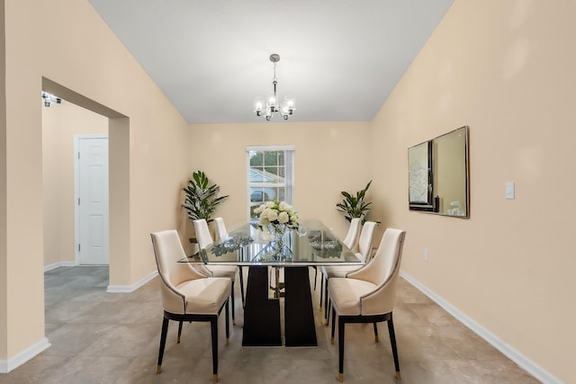 dining space with a notable chandelier