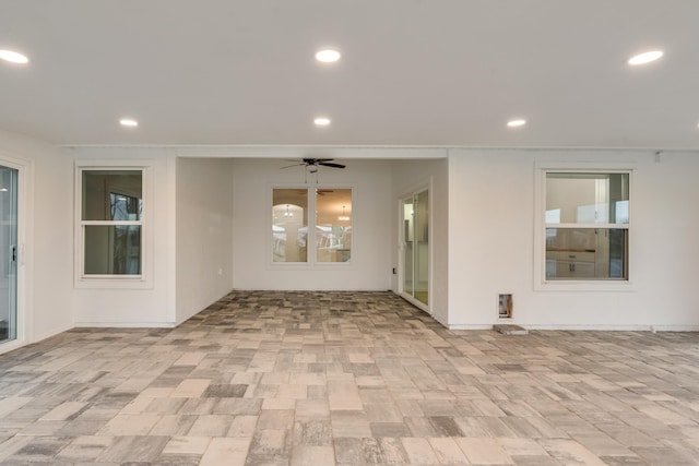 view of patio with ceiling fan