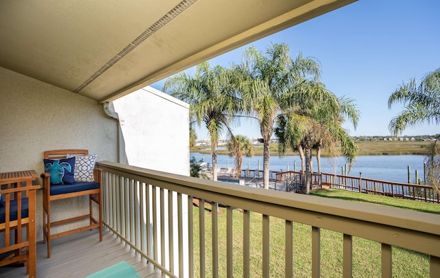 balcony featuring a water view