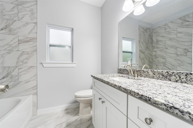 full bathroom featuring vanity, toilet, and tiled shower / bath combo