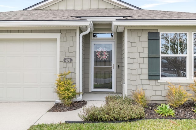 property entrance with a garage