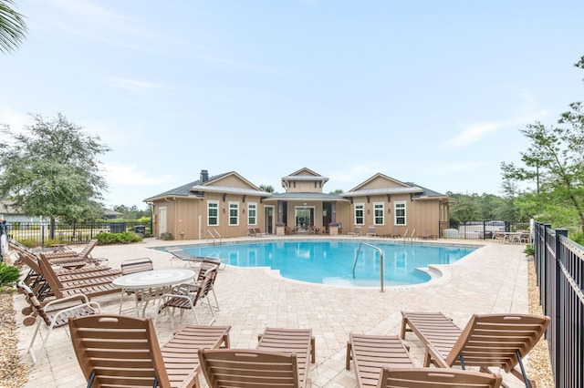 view of pool featuring a patio area