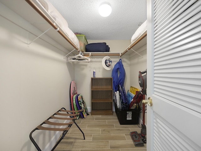 6240 A1A S Unit 103, Saint Augustine, FL 32080 - walk in closet featuring wood tiled floor