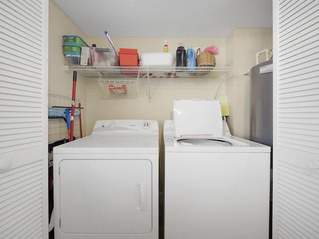 6240 A1A S Unit 103, Saint Augustine, FL 32080 - clothes washing area with washing machine and dryer and laundry area