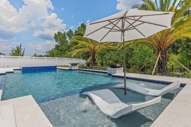 view of swimming pool with pool water feature