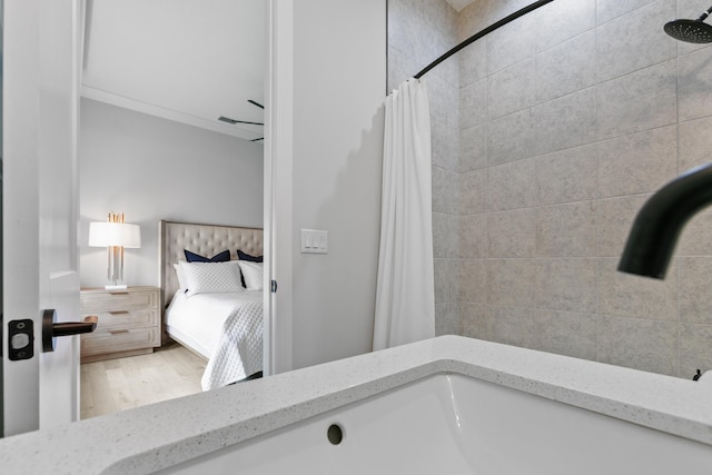 bathroom featuring a shower with shower curtain