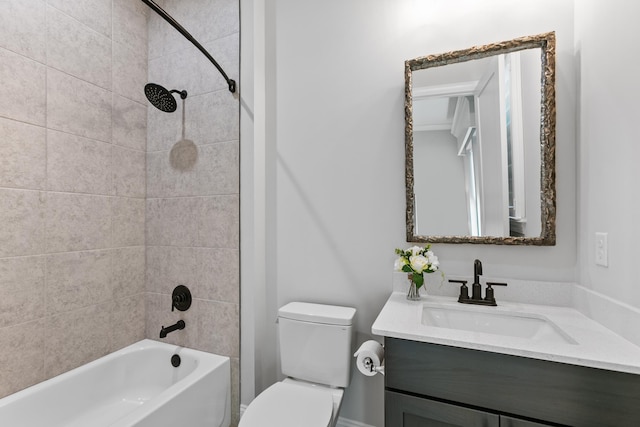 full bathroom with vanity, toilet, and tiled shower / bath