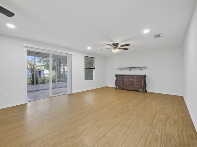 unfurnished living room with light hardwood / wood-style floors and ceiling fan