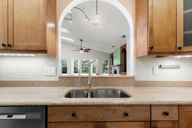 half bath featuring vanity, tile patterned floors, toilet, and a wainscoted wall