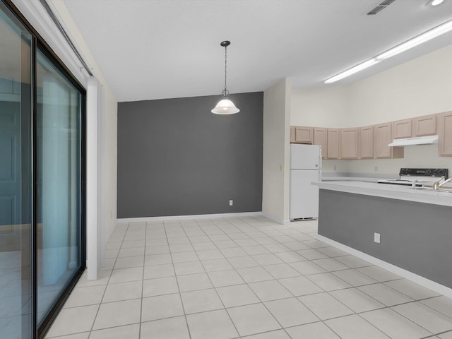 kitchen featuring pendant lighting, white refrigerator, light tile patterned floors, light brown cabinets, and black range with electric stovetop