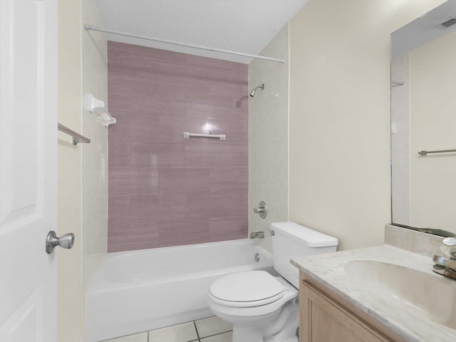 full bathroom featuring tile patterned floors, a textured ceiling, vanity, tiled shower / bath combo, and toilet