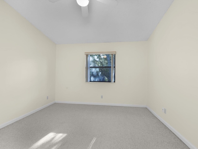 empty room featuring carpet flooring and ceiling fan