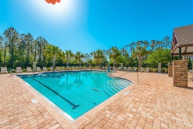 249 La Mancha Dr, Saint Augustine, FL 32086 - community pool with fence and a patio