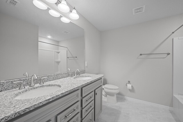 249 La Mancha Dr, Saint Augustine, FL 32086 - bathroom featuring visible vents, a sink, and toilet