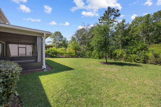 249 La Mancha Dr, Saint Augustine, FL 32086 - view of yard featuring a sunroom