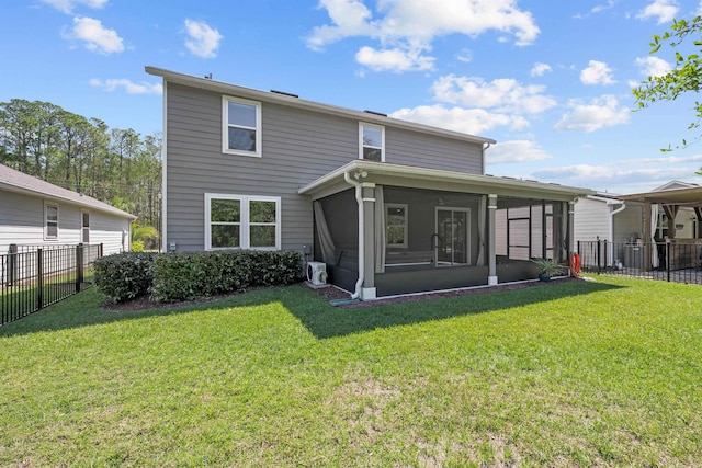 249 La Mancha Dr, Saint Augustine, FL 32086 - rear view of property featuring a lawn, a sunroom, and a fenced backyard