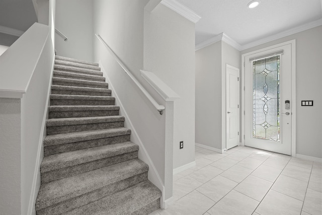 249 La Mancha Dr, Saint Augustine, FL 32086 - foyer entrance with stairs, crown molding, baseboards, and a wealth of natural light