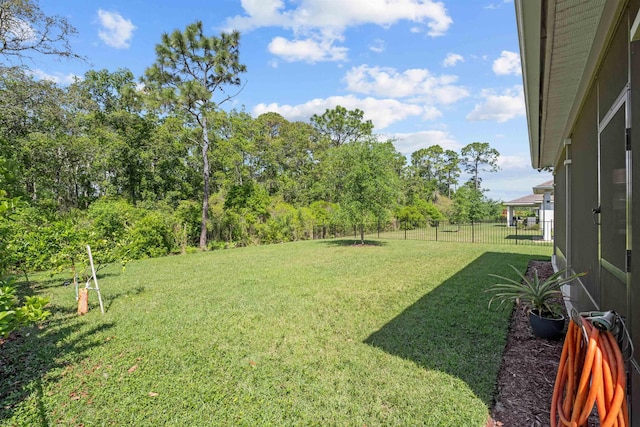 249 La Mancha Dr, Saint Augustine, FL 32086 - view of yard featuring fence