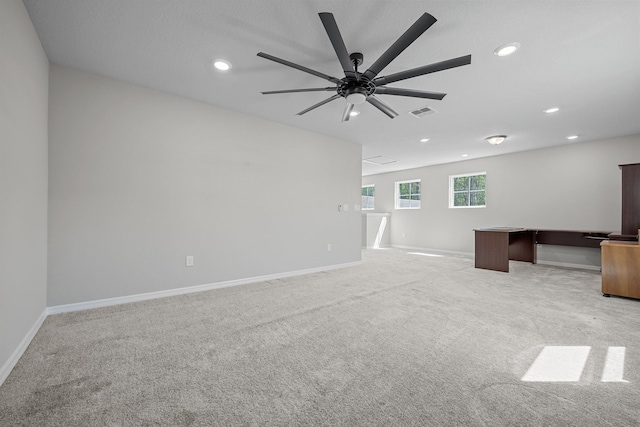 249 La Mancha Dr, Saint Augustine, FL 32086 - unfurnished living room featuring light colored carpet, recessed lighting, ceiling fan, and baseboards