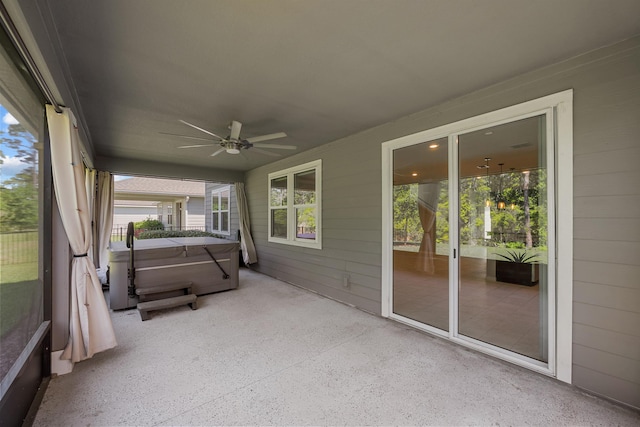 249 La Mancha Dr, Saint Augustine, FL 32086 - unfurnished sunroom with a jacuzzi and a ceiling fan