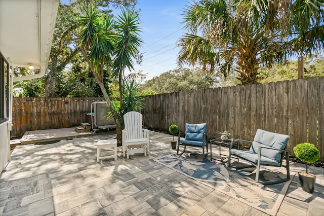 view of patio featuring a fenced backyard