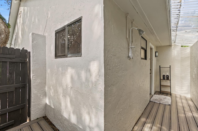 view of side of home featuring stucco siding