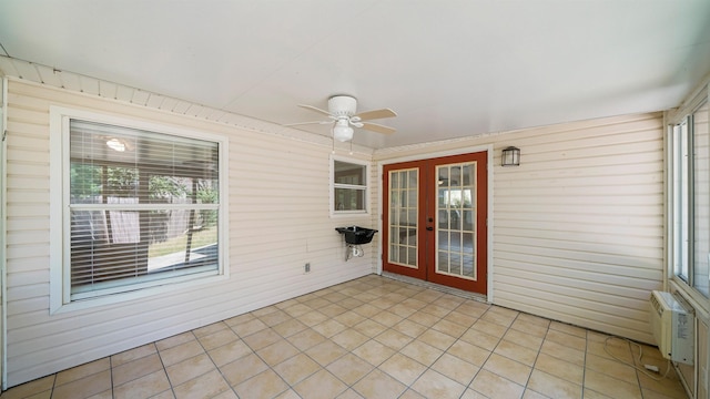 2169 Saint Martins Dr, Jacksonville, FL 32246 - unfurnished sunroom with french doors, ceiling fan, and healthy amount of natural light