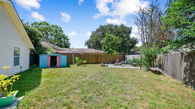 2169 Saint Martins Dr, Jacksonville, FL 32246 - fenced backyard with a storage unit and a patio