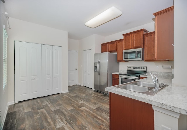 22 Buckley Ct, Saint Augustine, FL 32086 - kitchen featuring appliances with stainless steel finishes, light countertops, and dark wood-style floors
