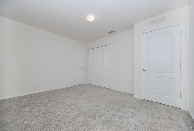 22 Buckley Ct, Saint Augustine, FL 32086 - unfurnished bedroom featuring carpet flooring and a closet