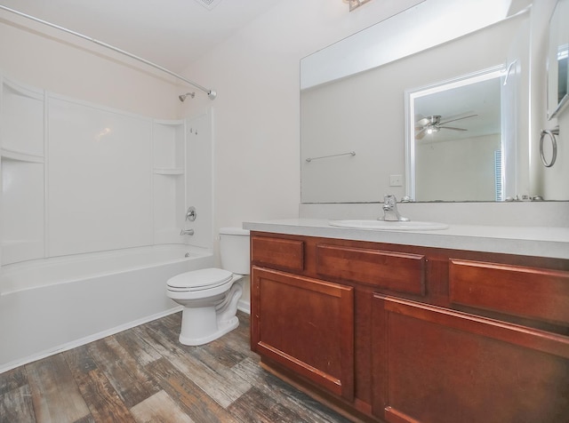 22 Buckley Ct, Saint Augustine, FL 32086 - bathroom featuring vanity,  shower combination, wood finished floors, and ceiling fan