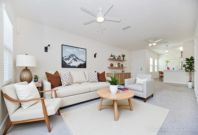 22 Buckley Ct, Saint Augustine, FL 32086 - living room featuring a ceiling fan and light colored carpet