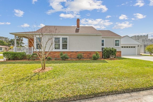 ranch-style home featuring brick siding, a chimney, covered porch, a front lawn, and stucco siding