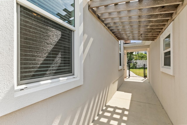 view of patio featuring fence