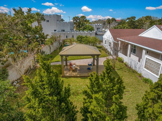 view of yard with fence and a gazebo