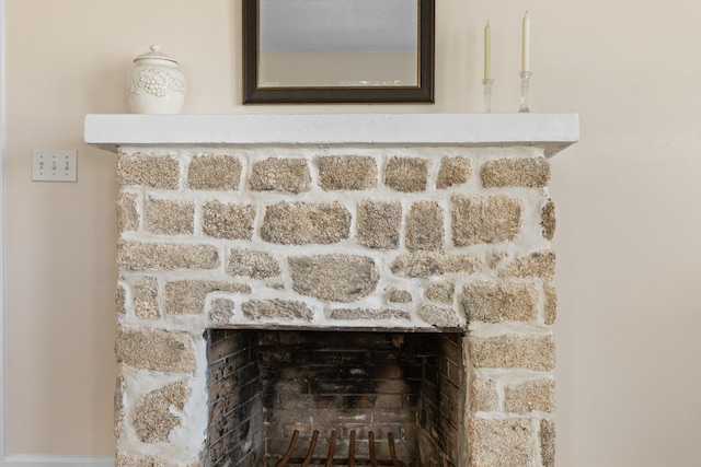 interior details with a fireplace