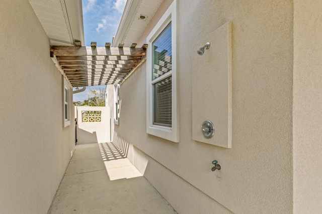 view of side of property with stucco siding