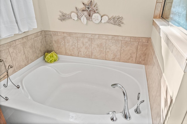 bathroom featuring a relaxing tiled tub