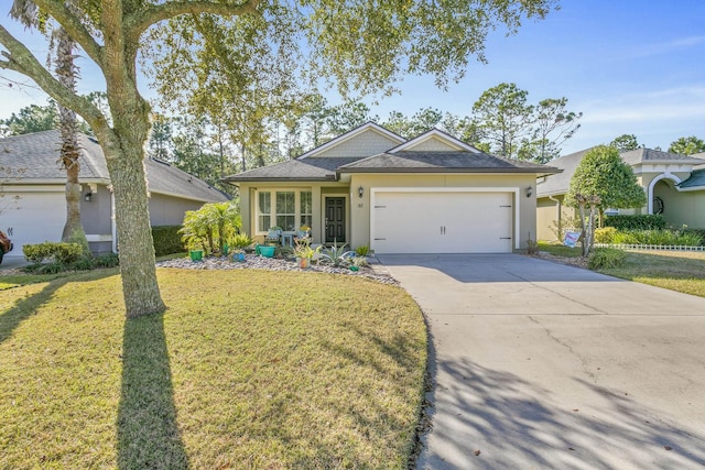 ranch-style home with a front yard and a garage